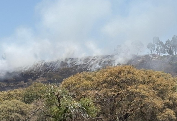 Investigan causas de incendio de relleno sanitario de Nanacamilpa