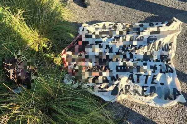 Cabezas humanas y una manta de amenazas fueron abandonadas en un predio ubicado a un costado de la carretera Ixtacuixtla-Nanacamilpa