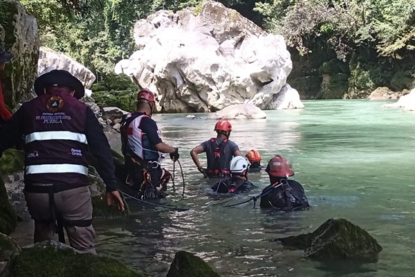 FGE Puebla y Comisión asume labores de búsqueda de menor arrastrada por río en Tlacotepec de Porfirio Díaz
