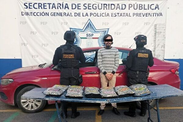 Detuvieron a Jorge Antonio N. por delitos contra la salud y aseguraron 12 empaques que almacenaban presunta marihuana en Coronango