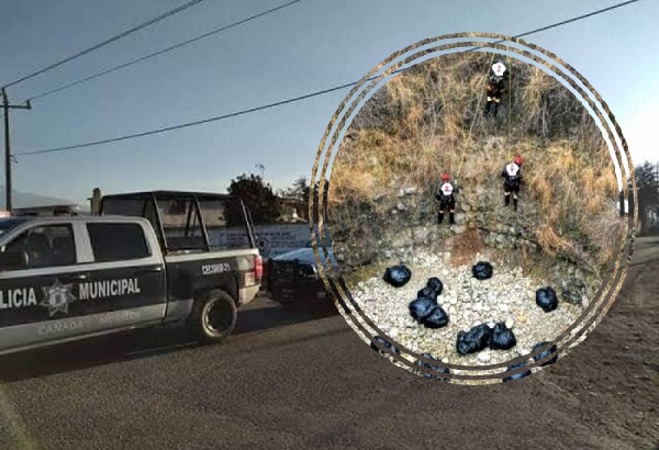 Serían 8 cadáveres hallados al fondo de una barranca de Cañada Morelos, Puebla; algunos estaban semienterrados y otros embolsados